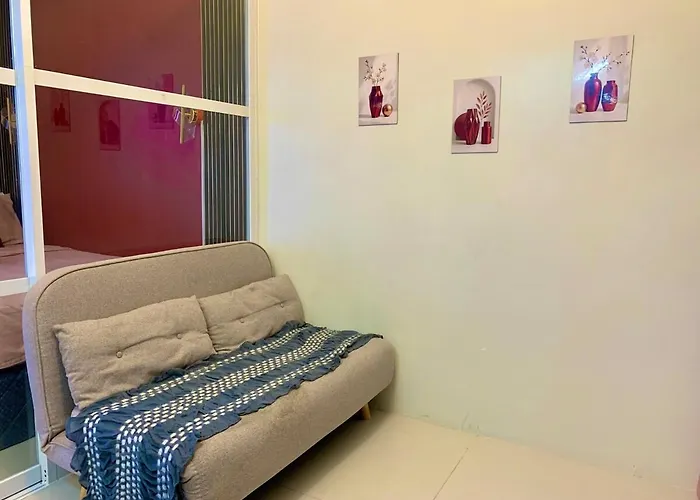 Cozy Maroon Theme And Lights View At Night Apartment